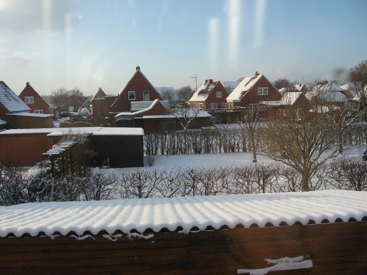 Die winterliche Landschaft aus dem Fenster der Ferienwohnung fotografiert